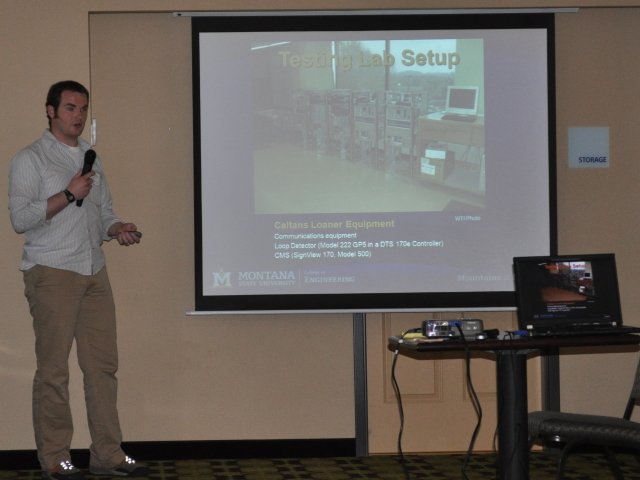 Kelvin Bateman from WTI shows the testing lab set-up for the Automated Safety Warning Controller system his team developed.
