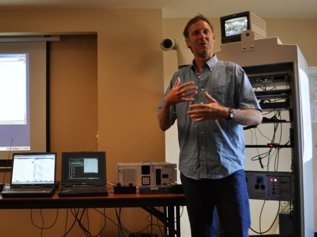 WTI Research Associate Dan Richter answers questions about the Automated Safety Warning Controller system he helped develop while the system is demonstrated during the Forum.