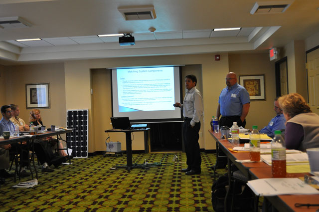 Mark Aragon and John Dickinson respond to a question during their presentation.