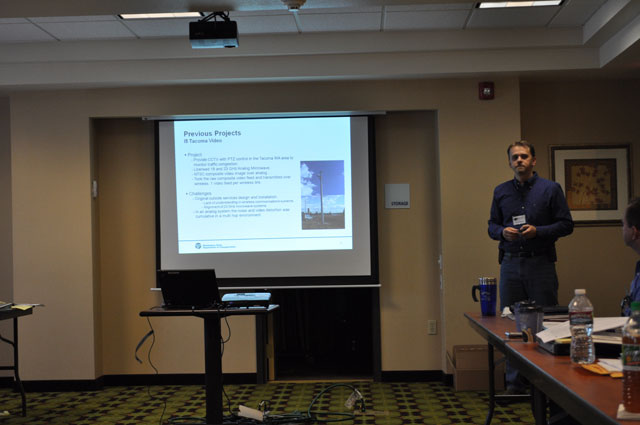 Tim McDowell listens to a question from Forum participants.